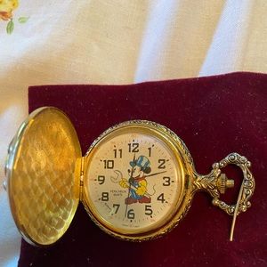 Disney Mickey Mouse pocket watch.  Like new. Requires a battery.